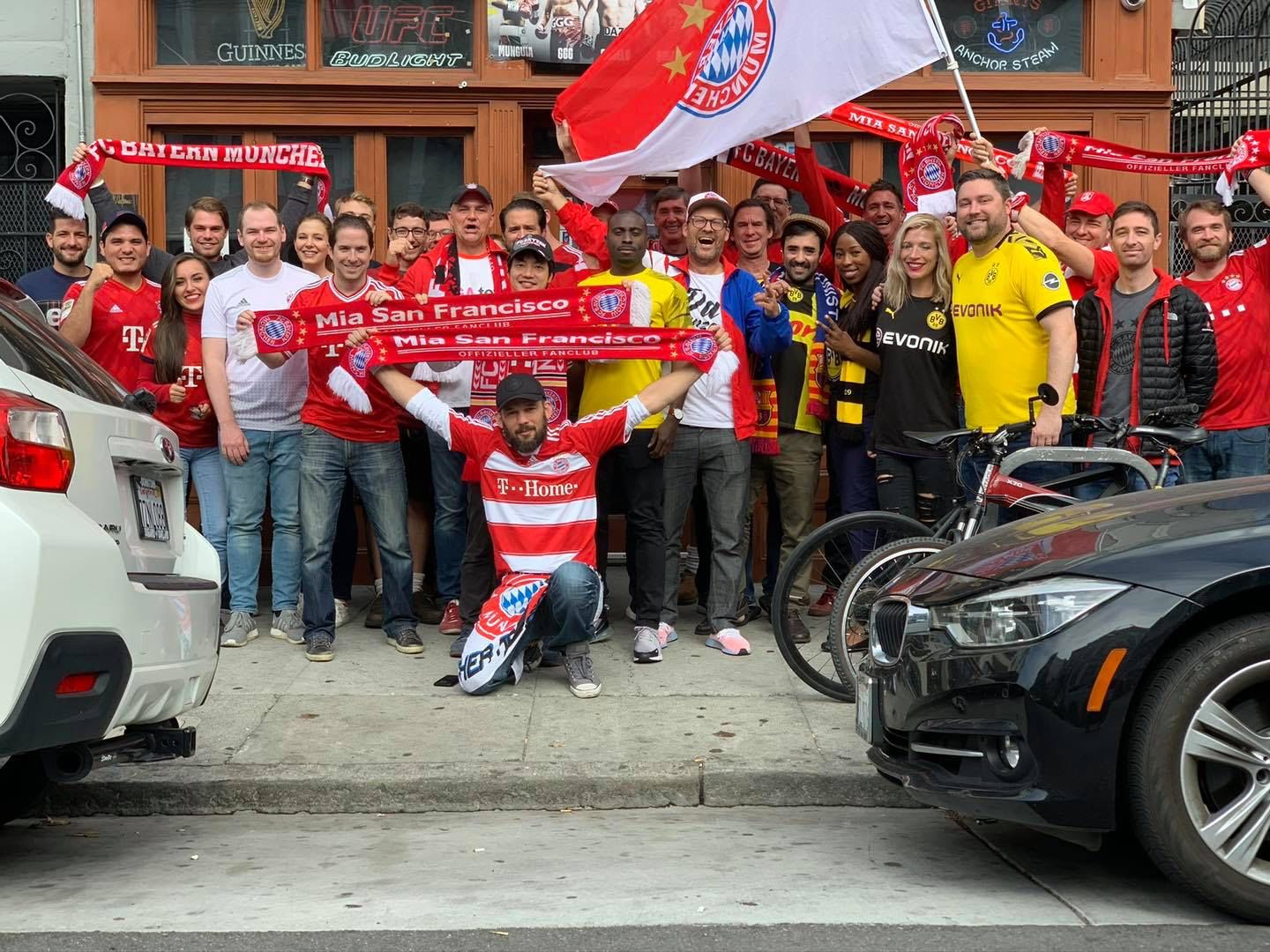 Big group with scarves and flags